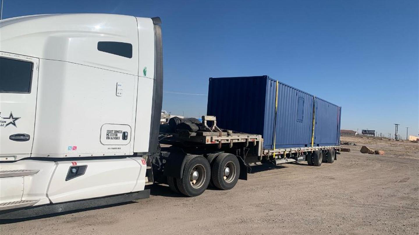 Shipping container on a chassis ready to move