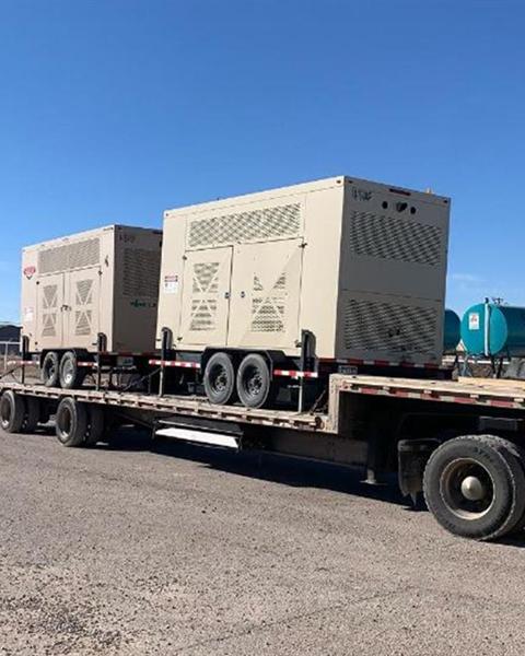 Industrial generator units secured on a trailer