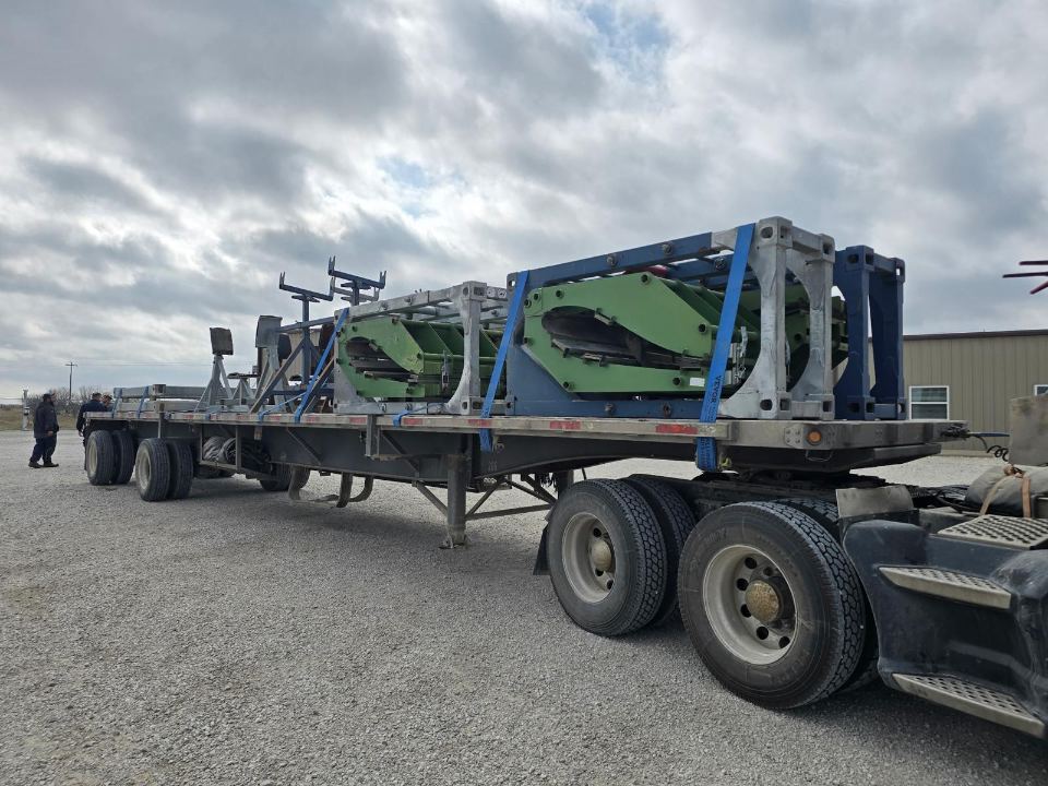 Steel racks loaded on a flatbed trailer