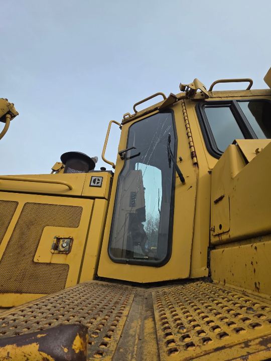 CAT heavy equipment positioned for hauling