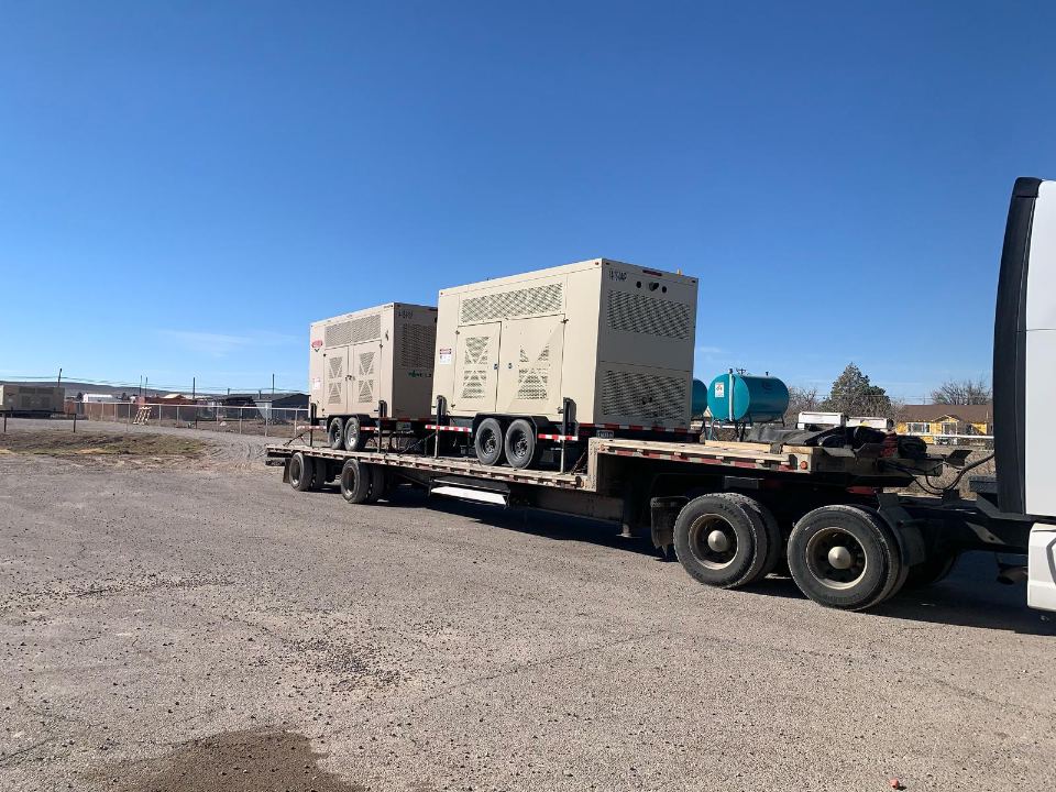 Industrial generator units secured on a trailer