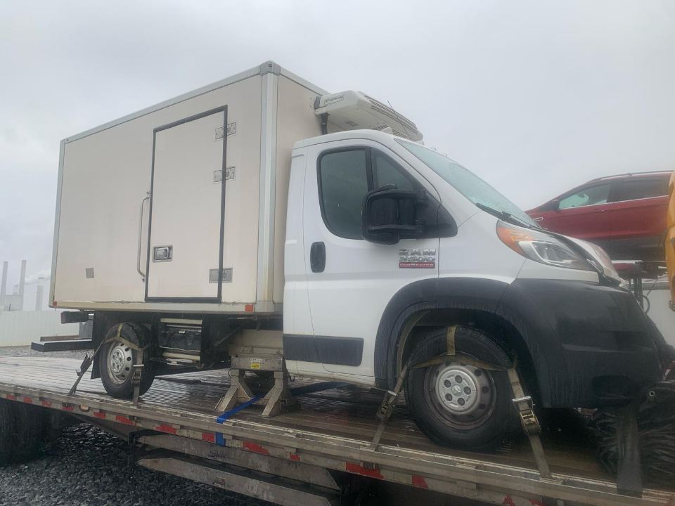 Refrigerated van truck loaded for transport