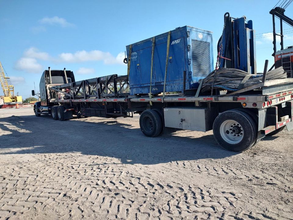 Industrial equipment units staged for transport